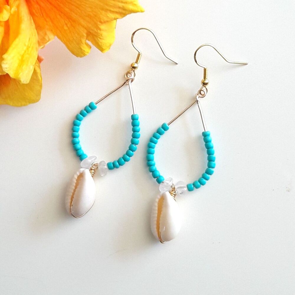 artisan earrings 625#mfs Quartz & Cowrie shells sky blue seeds on teardrop golde